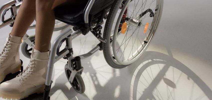 Close up of a patient's legs on a wheelchair