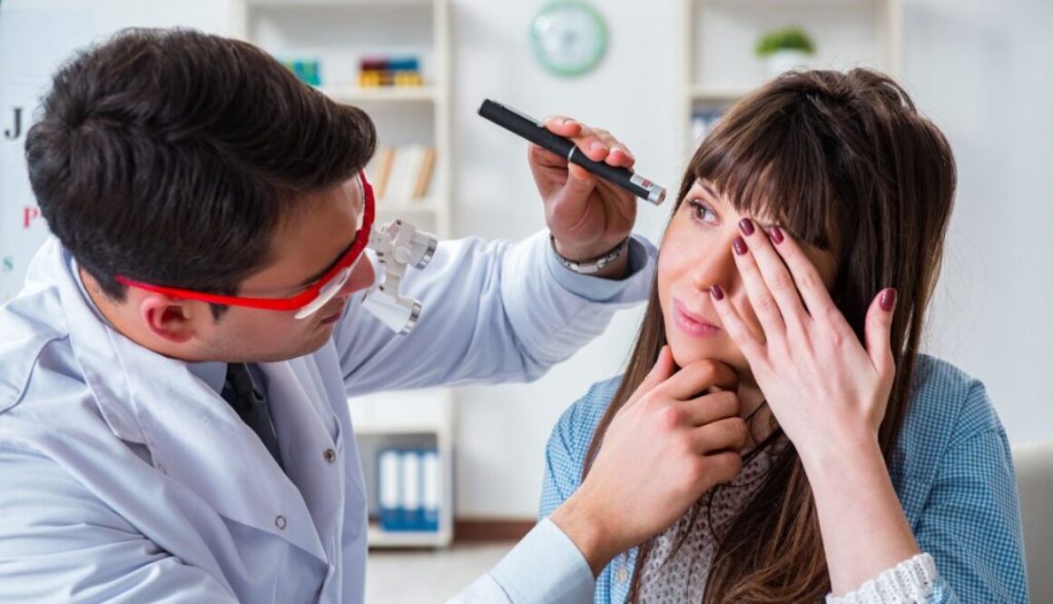 The doctor checks why the woman has dry eyes.