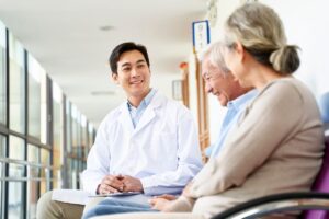 The aged couple is happy while talking to the doctor because they are recovering quickly.