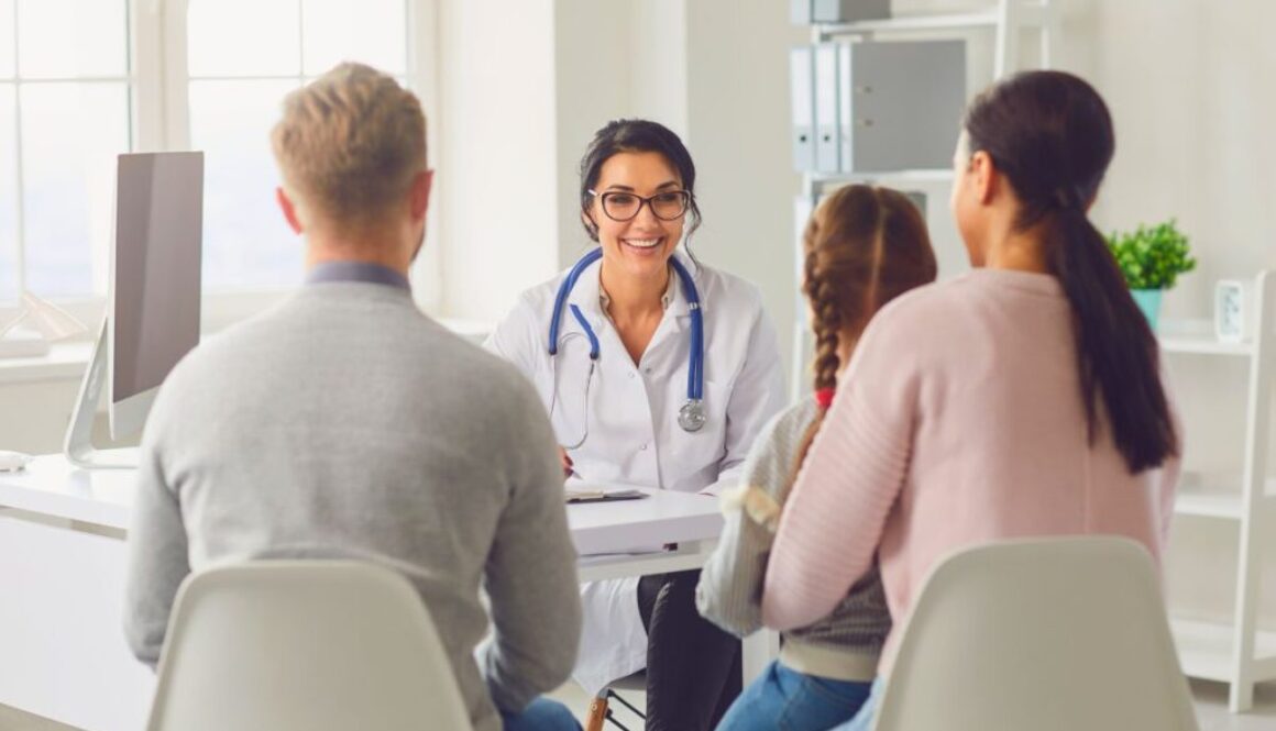 The doctor happily discusses the benefits of regenerative medicine with the family.