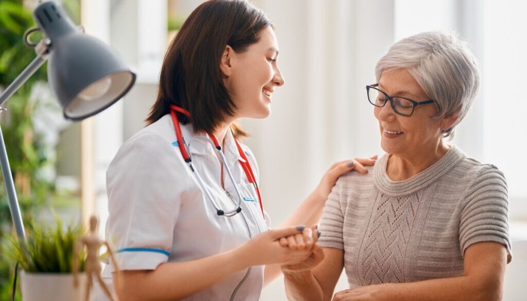 The doctor happily discusses how regenerative medicine treatment can help the older woman.