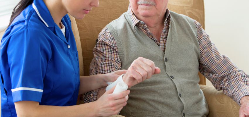 The caregiver uses amniotic tissue allografts containing Extracellular Matrix Proteins for tissue repair.